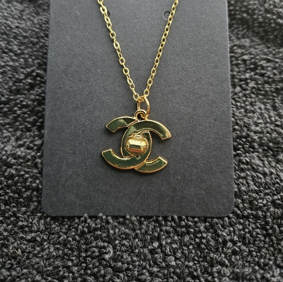 CHANEL Jewelry - Elegant Gold Charm
